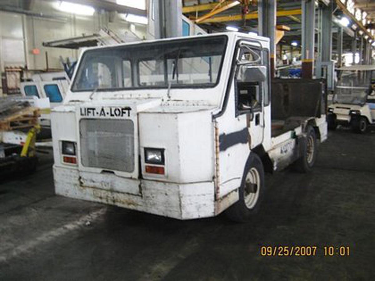 2000 Lift-A-Loft APV Flat Bed