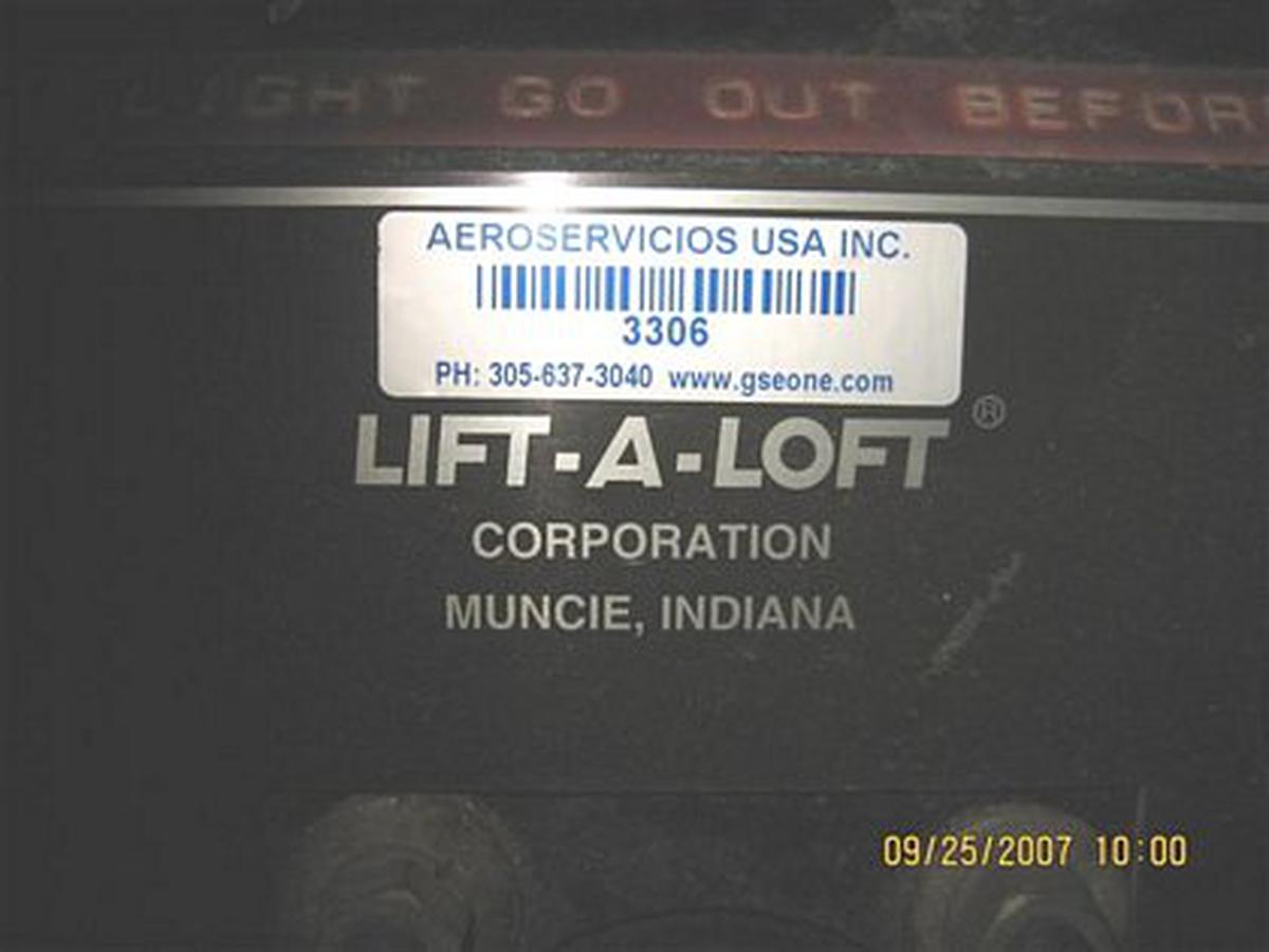 2000 Lift-A-Loft APV Flat Bed